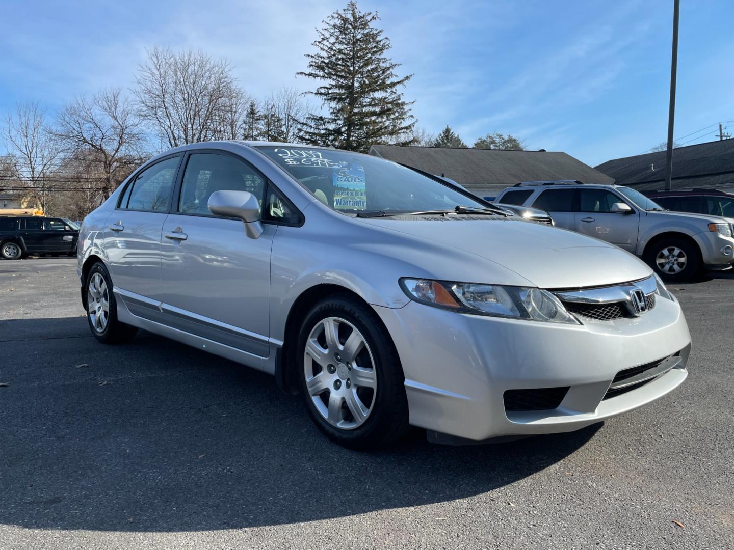 2009 silver Honda Civic LX Sedan 5-Speed AT (2HGFA16529H) with an 1.8L L4 SOHC 16V engine, 5-Speed Automatic transmission, located at 101 N. Main Street, Muncy, PA, 17756, (570) 546-5462, 41.207691, -76.785942 - Photo#0